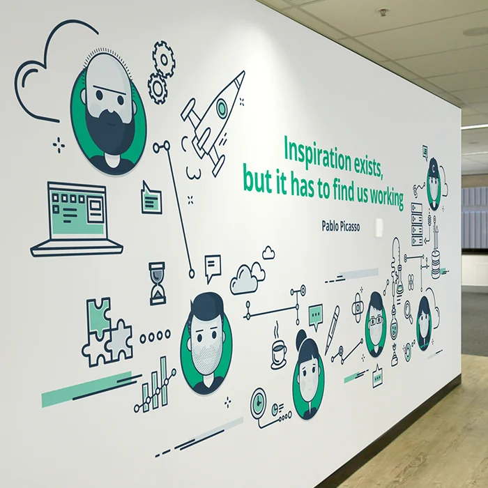 Creative illustrated office mural with quotes and artwork