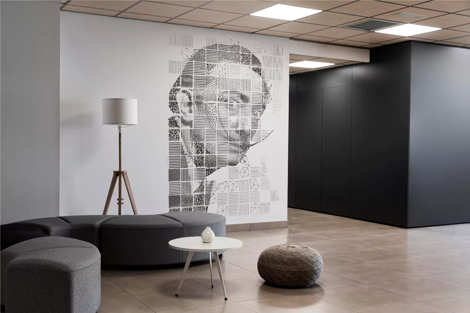Geometric portrait wall art in corporate lobby